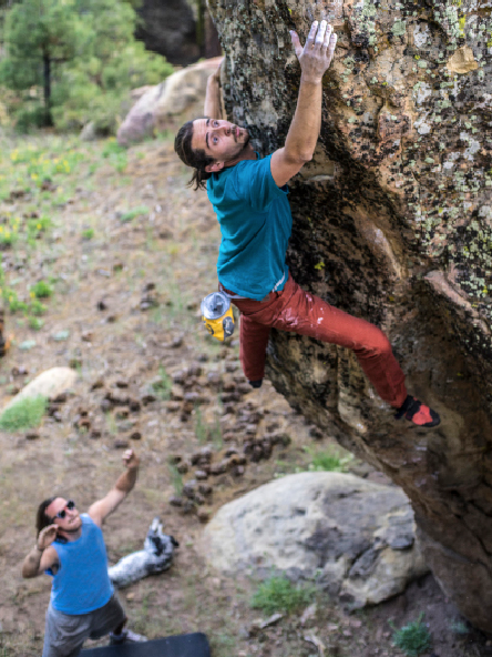 Backcountry climbing expert Niko unlocking the translation on a boulder problem at Pine Mountain