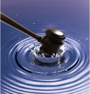 Gavel Hits the water's surface