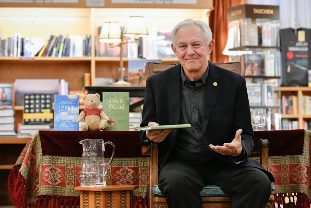Dr. Joe Parent with a selection of his books.
